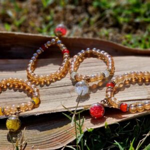 Golden brown beads with ball charms