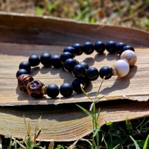 Big black beads with ornaments