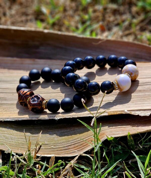 Big black beads with ornaments